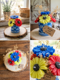 Vibrant Wax Flowers in Blue Checkered Vase